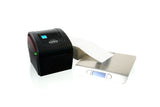 Black label printer with a roll of labels on a white background